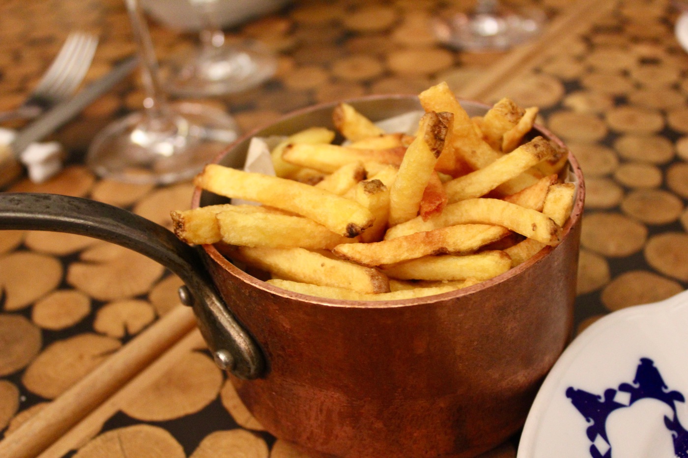 Side of fries in a copper pot at Cestr in Prague, Czech Republic