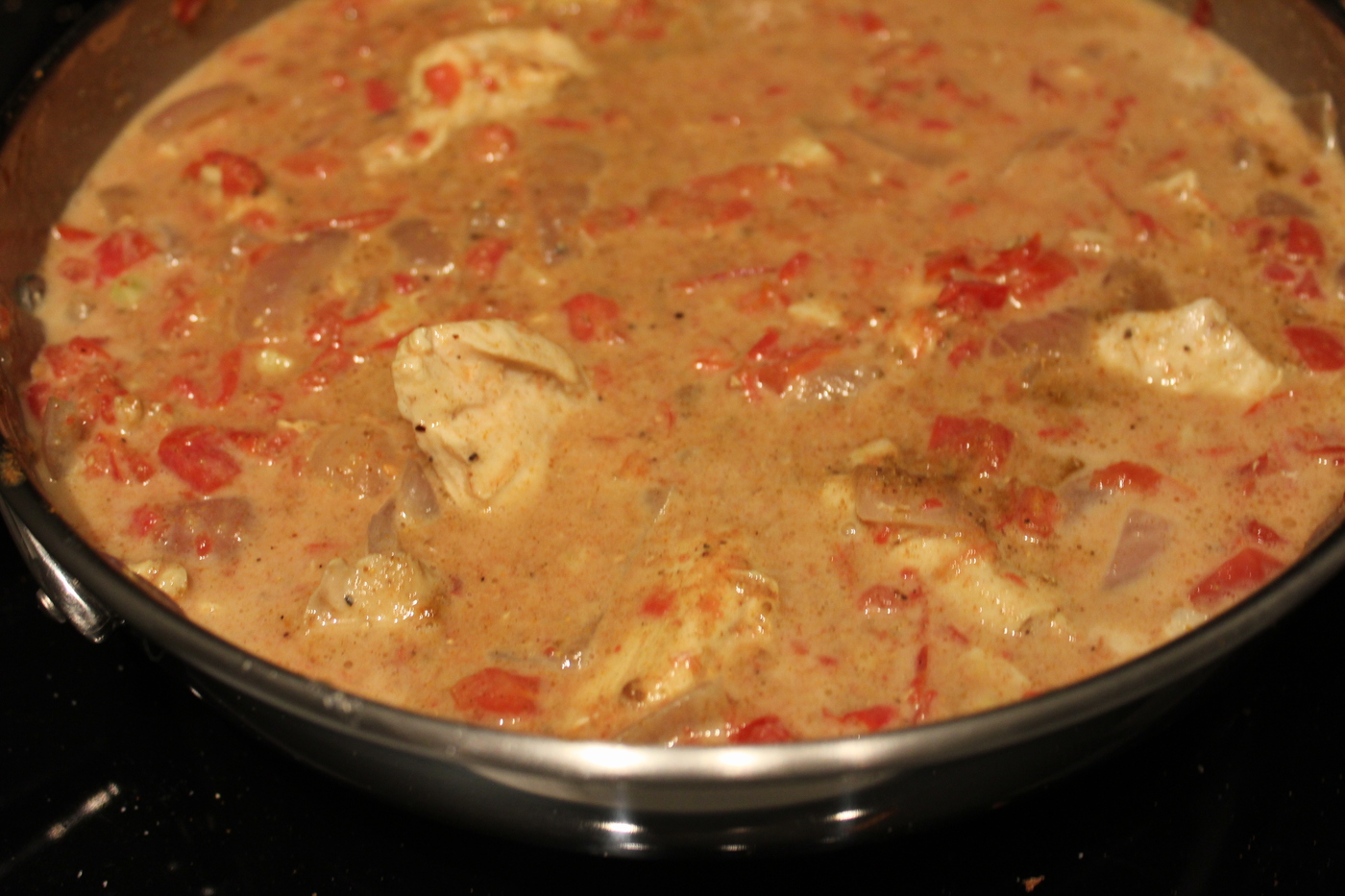 Coconut curry chicken simmering