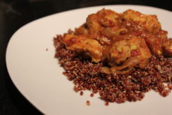 Coconut curry chicken on a white plate