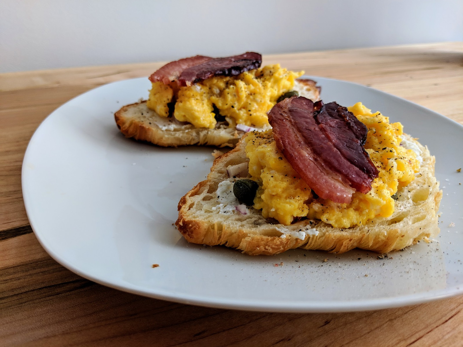 Open-faced croissant breakfast sandwich