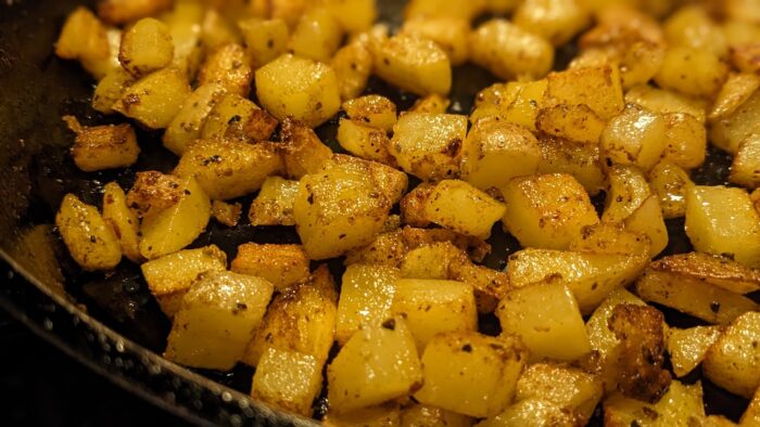 Breakfast potatoes / home fries prepared with method 2: diced smaller, no parboiling