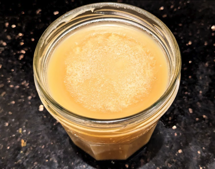 Solidified ghee in a jar, to be stored in the fridge