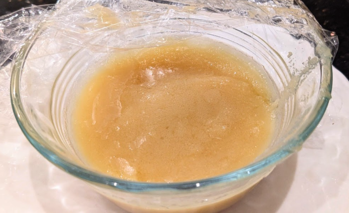 Ghee, solidifying in a clear bowl